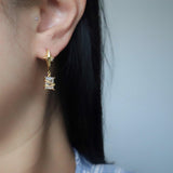 Aretes con estrella colgante