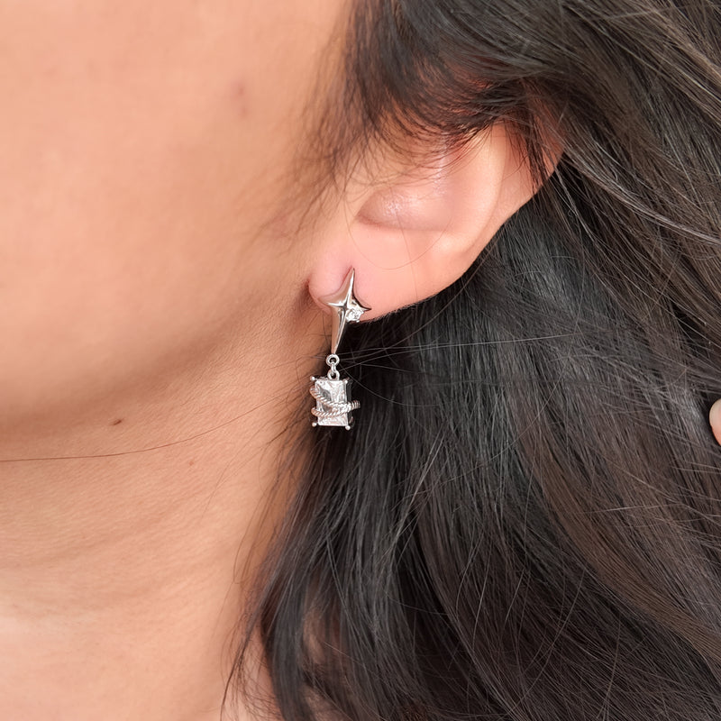 Aretes con estrella colgante